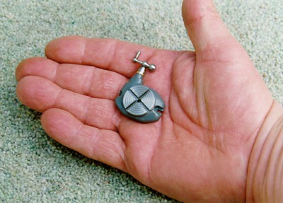 The tiny 60:1 rotary table that accompanies the miniature Bridgeport. Tiny cutters had to be fabricated to cut the T-slots.
