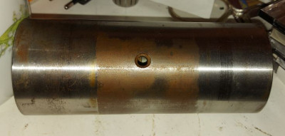 Díra v pouzdru vřetene