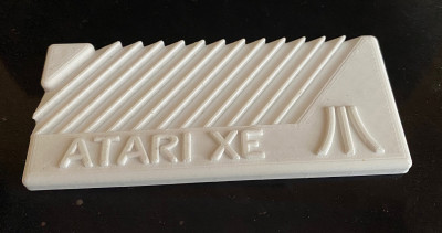 atari_XE.jpg (410.8 KiB) Zobrazeno 5136 x test z PETG 115x50x5mm, origo bude šedé PLA